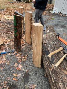 Splitting timber.